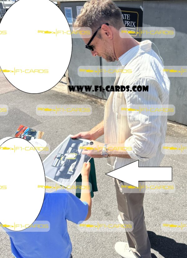 Photo. "2009 Formula 1 World Champion" - signed by driver Jenson Button